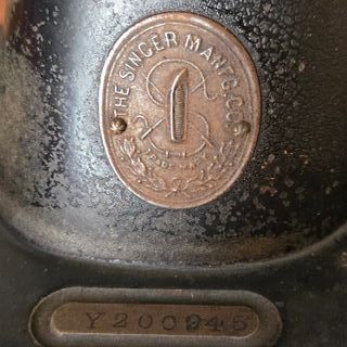 Maquina de coser Singer antigua