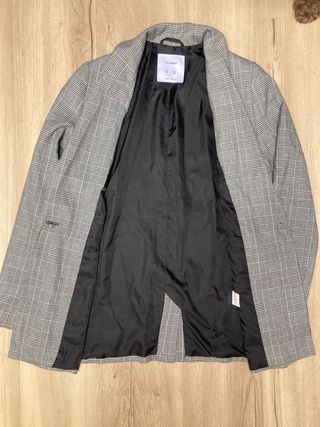 Blazer de cuadros. Perfil solidario