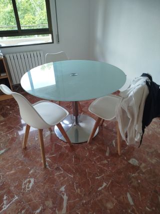Mesa de comedor redonda de cristal