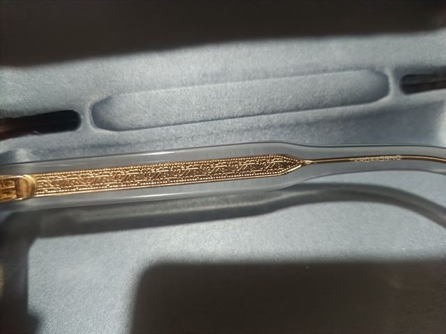 Gafas de sol Gucci doradas y amarillas