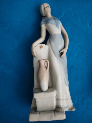 Figuras de porcelana Tito y reloj vintage