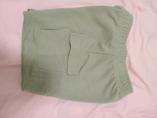 Chándal verde con bolsillos