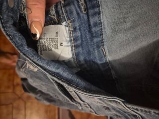 Peto vaquero con perlas, brillantes y rotos