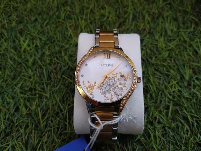 Conjunto Skyline: Reloj y 2 Pulseras Doradas