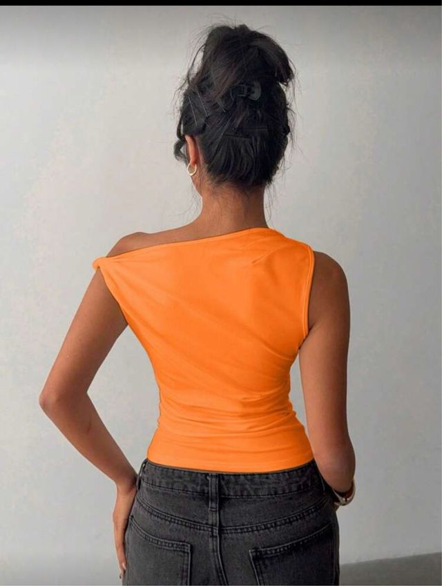 Top naranja asimétrico talla única