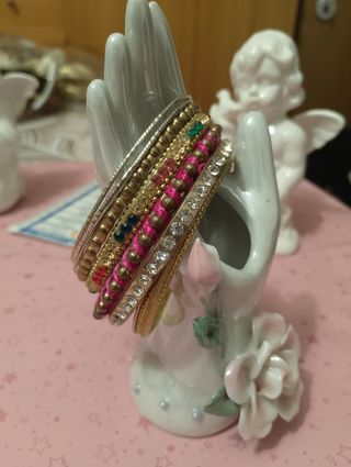 Set bracciali vintage indiani oro e rosa