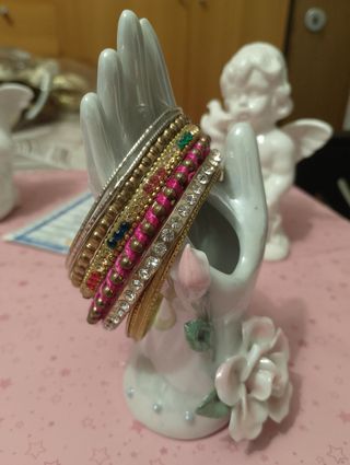 Set bracciali vintage indiani oro e rosa
