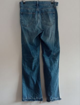 Pantalones vaqueros azules con raya blanca. T38. 