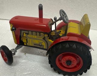 Tractor de hojalata con remolque