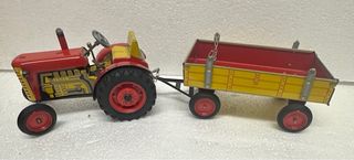 Tractor de hojalata con remolque
