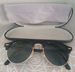 Gafas de sol Ray-Ban Clubmaster negras y doradas