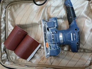 Lijadora Dexter NC200ES y tres rollos  de lija