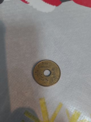 Moneda Juan Carlos I 1991 con agujero