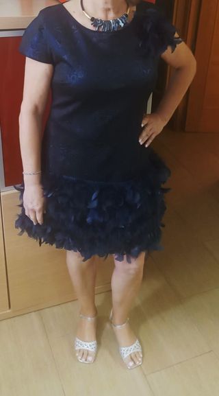 Vestido de fiesta con plumas