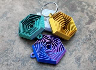 Llavero Hexagonal Anti-Estrés