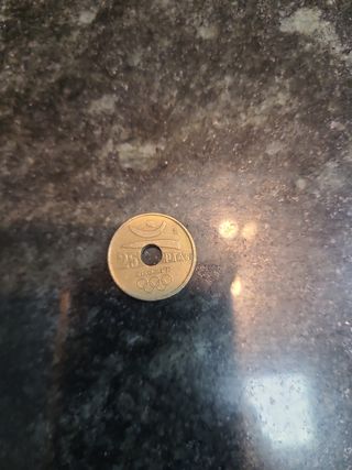 Moneda ESPAÑA 1990 con agujero