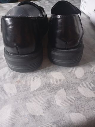 Zapatos negros tipo mocasín