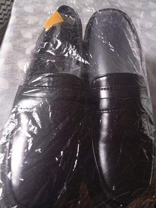 Zapatos negros tipo mocasín