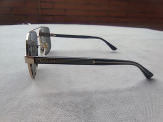 Gafas de sol Gucci GG0529S 001 Doradas/Grises
