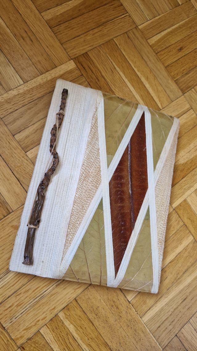 Album fotografico con decorazioni naturali