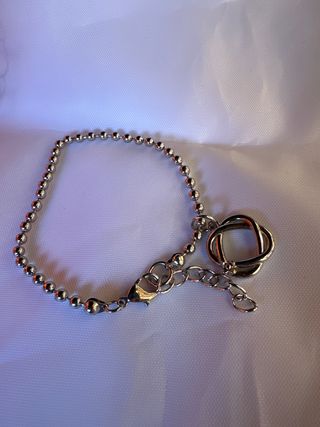 Bracciale con ciondolo nodo