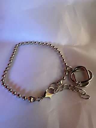 Bracciale con ciondolo nodo
