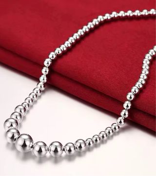 Conjunto de collar y pulsera de bolas