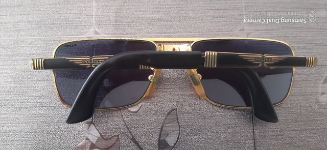 Occhiali da sole Police uomo neri e oro