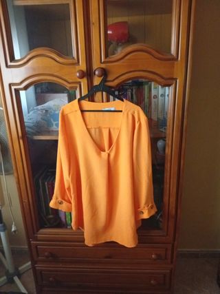 Blusa naranja manga larga