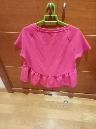 Blusa rosa con volantes