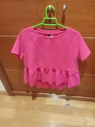 Blusa rosa con volantes
