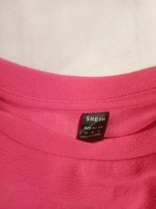 Blusa rosa con volantes