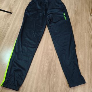 Pantalón chándal KELME negro y verde