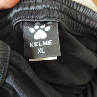 Pantalón chándal KELME negro y verde