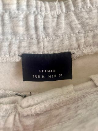 Pantalón chándal gris con cremalleras