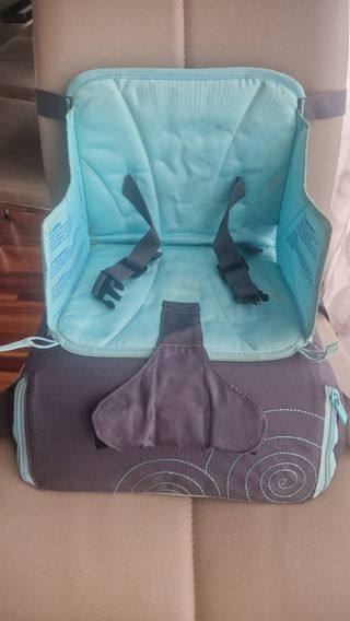 Trona portátil infantil. Marca Munchkin