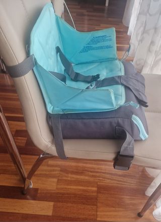 Trona portátil infantil. Marca Munchkin
