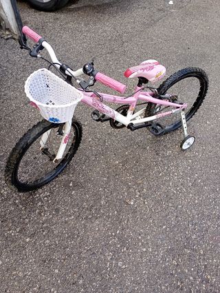 Bicicleta niña rosa con canasta 