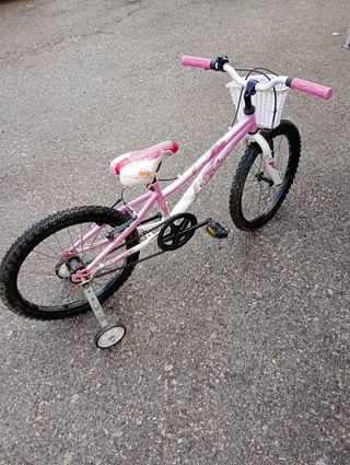 Bicicleta niña rosa con canasta 