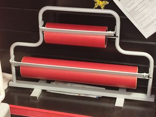 Soporte para rollos de papel de regalo