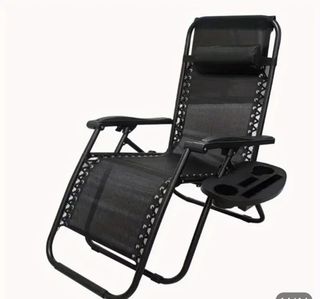 Tumbona plegable negra exterior en caja sin abrir