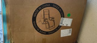 Tumbona plegable negra exterior en caja sin abrir