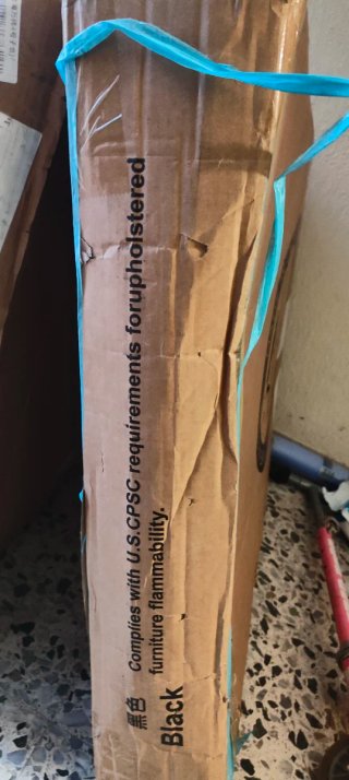 Tumbona plegable negra exterior en caja sin abrir