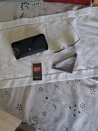 Gafas de sol Ray-Ban doradas con cristales verdes