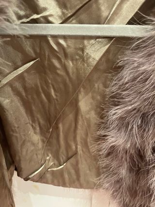 Chaleco de plumas.