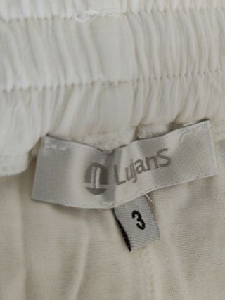 Falda larga blanca plisada