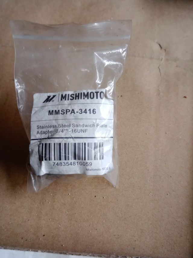 Adaptador Sándwich Mishimoto 3/4-16UNF