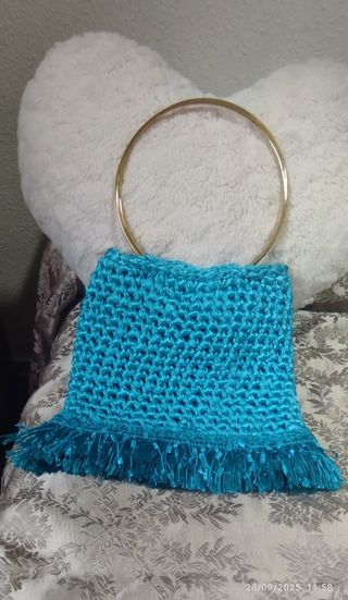 Bolso de mano azul turquesa con flecos