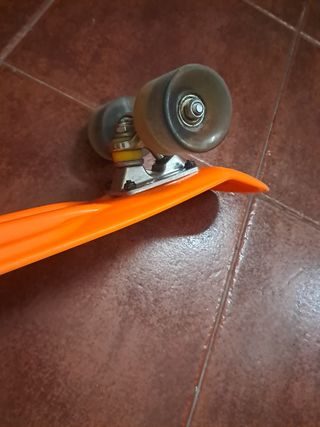 Monopatín naranja