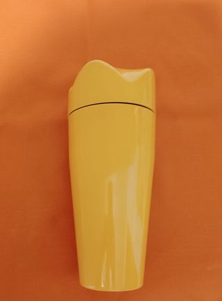 Vaso recipiente amarillo con tapa